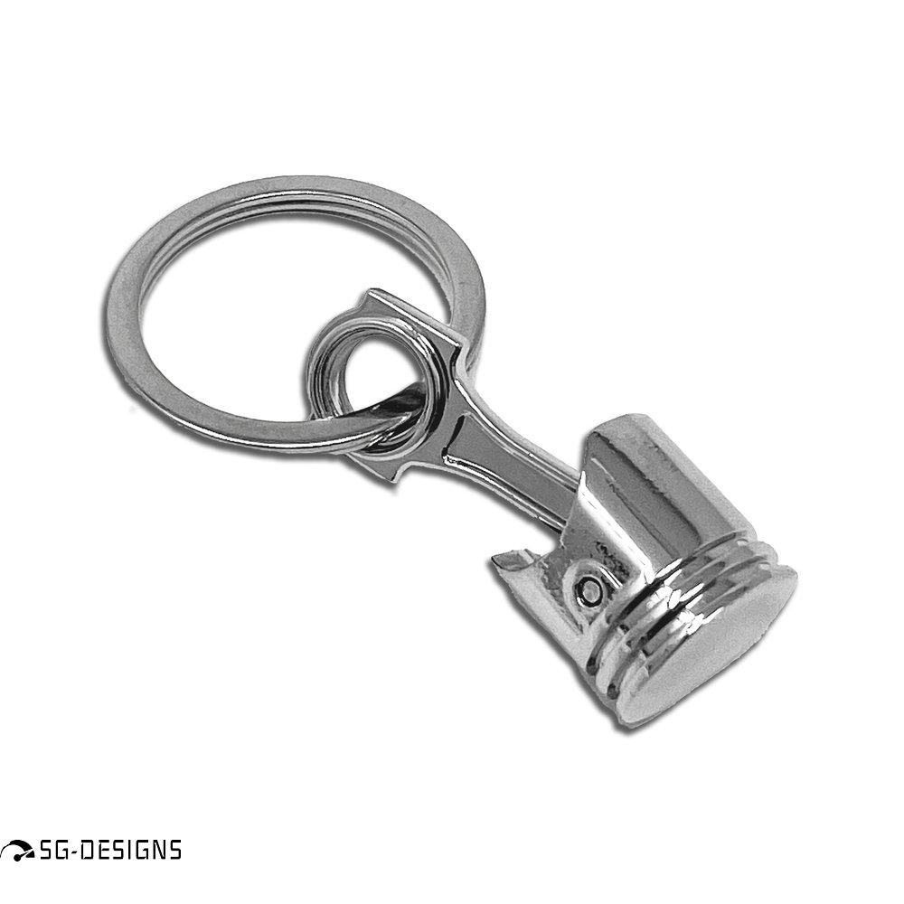 Klíčenka motorový píst